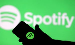 How much does Spotify pay its employees